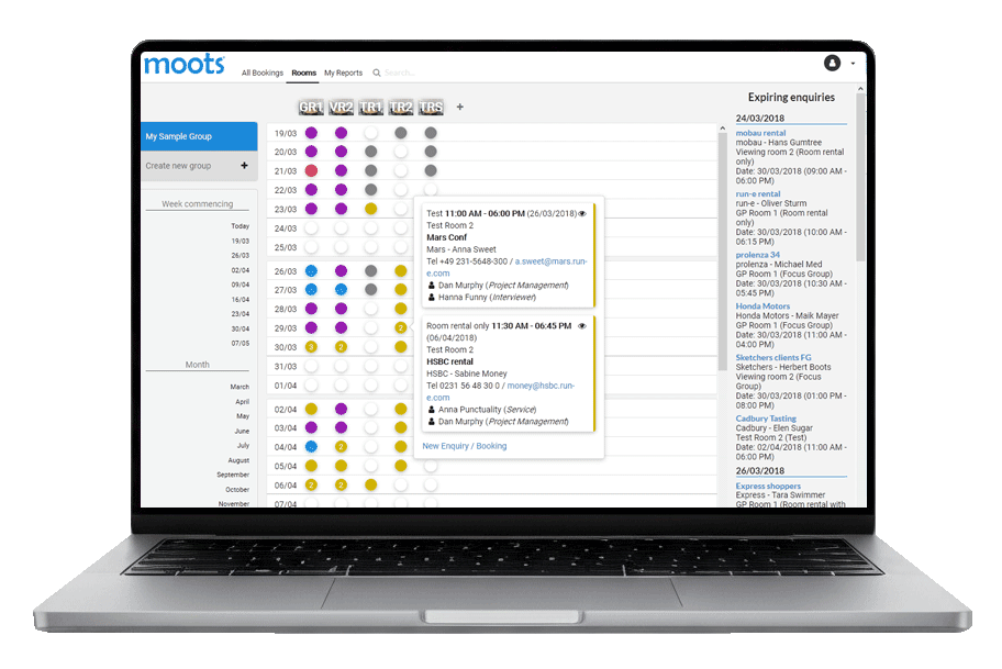 A laptop screen displays the Moots booking system showing a weekly room schedule. Colored dots represent room bookings across different dates and times, with a pop-up displaying detailed booking information such as client name, project, and assigned personnel.
